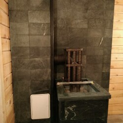 Монтаж банной печи Гефест в змеевике