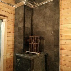 Монтаж банной печи Гефест в змеевике